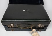 Antique leather travelling case fitted with an assortment of sterling silver topped accessories, boxes, jars, brushes etc., many manufactured by Asprey of London, early 20th century, the case 52cm wide. - 2