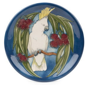 MOORCROFT "Sulphur Crested Cockatoo" pottery plate on blue ground, limited edition 52/350, retailed by Dalby Antiques Melbourne, circa 1995, factory mark to base, with original box of issue, 26.5cm diameter.