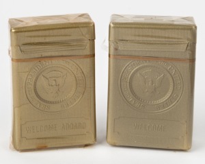 AIR FORCE ONE: Two Nixon administration sealed packs of twenty Philip Morris cigarettes, with text "Welcome Aboard Air Force One" and Presidential Seal.