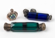 Two green and Bristol blue antique glass double ended scent bottles with silver tops, (A/F); together with a silver and millefiori scent bottle, 19th and 20th century, (3 items), the largest 12cm long.