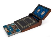 An antique English walnut sewing box lap desk with Tunbridge style banding. Interior handsomely fitted with compartments in original blue silk housing antique portrait photographs, 19th century, 17cm high, 31cm wide, 23cm deep. - 3
