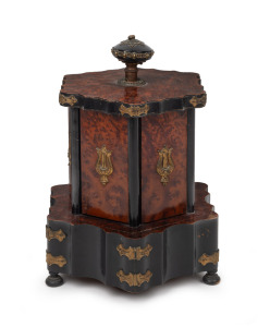 An antique French Napoleonic carousel sewing box thread dispenser in amboyna with ebony finish and gilt metal mounts, early 20th century, 24cm high.