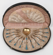 An antique Dutch silver oyster set with original gilt finish and blue enamel decoration, housed in a plush fitted demi-lune box, circa 1900, ​​​​​​​the case 32cm wide, 130 grams total.