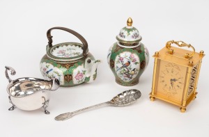 KAISER "Mandschu" German porcelain teapot and matching ginger jar; together with a silver plated berry spoon, a German brass cased table clock with eight day movement and a silver plated sauceboat by HARDY BROTHERS, 20th century, (5 items), the ginger jar