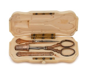An antique ivory cased pocket sewing necessaire with gold-plated implements, early to mid 19th century, 10cm wide.