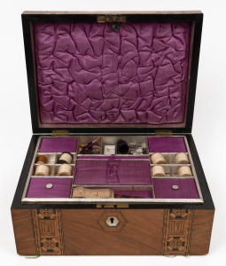 An antique English walnut sewing box with Tunbridge banding and original purple silk fitted interior, housing an assortment of sewing tools and accessories, 19th century, 15cm high, 30cm wide, 22cm deep.