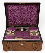 An antique English walnut sewing box with Tunbridge banding and original purple silk fitted interior, housing an assortment of sewing tools and accessories, 19th century, 15cm high, 30cm wide, 22cm deep.