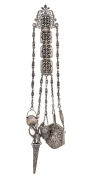 An antique English silver plated chatelaine, 19th century, 37cm high overall.