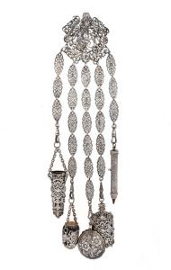 An ornate antique silver plated chatelaine, 19th century, 29cm high overall.