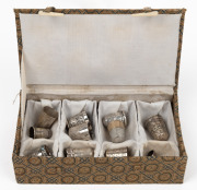 Twelve assorted silver thimbles, including unusual fingernail example.