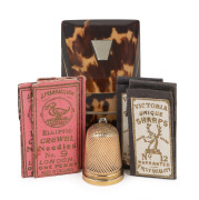 An antique 9ct gold thimble, housed in an attractive tortoiseshell and ivory fitted case with assorted needle packets, 19th century, the thimble 5.5 grams, the case 5cm high. - 2