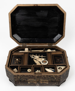 An antique Chinese export ware lacquered sewing box with chinoiserie decoration, interior fitted with compartments and housing a selection of bone and ivory implements, 19th century, 14cm high, 33cm wide, 24cm deep.