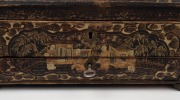 An antique Chinese export ware lacquered sewing box with chinoiserie decoration, interior fitted with compartments and housing a selection of bone and ivory implements, 19th century, 14cm high, 33cm wide, 24cm deep. - 3