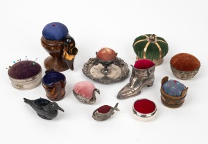 Twelve assorted antique and vintage pin cushions, including sterling silver, pewter and wood, mixed vintages and origins, the largest 11cm high.