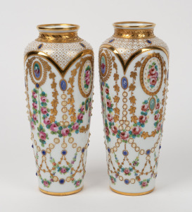 DRESDEN pair of antique German mantle vases adorned with floral vignettes and swags plus ornate gilt highlights, 20th century, blue factory mark to base, 23cm high.