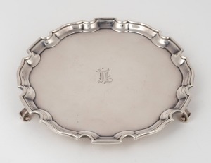 An English sterling silver salver with engraved ownership monogram, mid 20th century, 20.5cm wide, 355 grams.