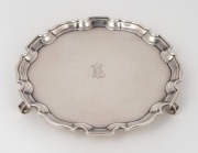 An English sterling silver salver with engraved ownership monogram, mid 20th century, 20.5cm wide, 355 grams.