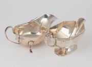 Two antique and vintage English sterling silver sauce boats, 19th and 20th century, the larger 17cm long, 334 grams total. - 2