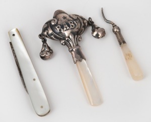 Antique sterling silver and mother of pearl handled baby rattle; together with a mother of pearl handled pen knife and sewing implement, 19th century, (3 items), the rattle 7cm high.