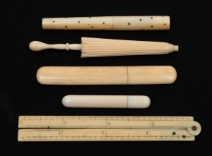 Antique ivory ruler and needle cases, including a novelty umbrella example, 18th/19th century, (5 items), the ruler 8" extended.