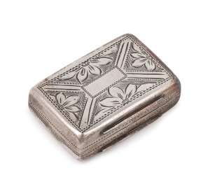 An antique English sterling silver vinaigrette with engraved decoration, made in Birmingham, circa 1845, 2.5cm wide.