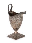 A Georgian sterling silver helmet cream jug with engraved decoration by Peter & Ann Bateman, London, circa 1791, ​​​​​​​14cm high, 96 grams.