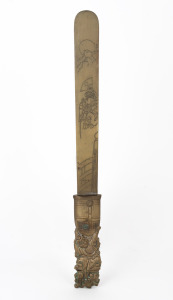 An antique Japanese gilt brass page turner, Meiji period, 19th century, ​​​​​​​31.5cm long.
