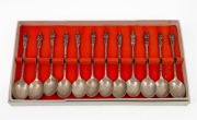 A set of twelve 835 Dutch silver apostle spoons in original card box, mid 20th century, 165 grams total.