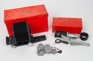 LEITZ: Group of c. 1950s accessories comprising UXOOR bellows in original red box, Synchronblitzer in original red box, Leica-Meter MC, plus one other. (4 items)