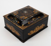 An antique English papier-m&acirc;ch&eacute; sewing workbox fitted with lift-out tray and compartments adorned with original purple velvet and silk, also includes a selection of threads, thimbles, shuttles and sewing accessories, 19th century, 14cm high, 28cm wide, 25 - 3
