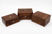 Three antique English walnut sewing work boxes, including two examples adorned with Tunbridge inlaid decoration, 19th century, the largest 14cm high, 27cm wide, 20cm deep.