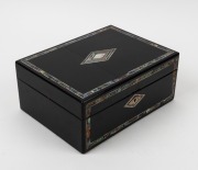 An antique sewing work box with ebonized finish and shell inlaid decoration. Interior handsomely fitted in scarlet and cream silk with compartments and an assortment of mother of pearl sewing implements, 19th century, 13cm high, 30cm wide, 23cm deep. - 3