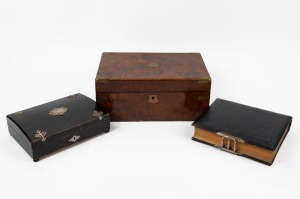 Antique English walnut writing box; together with an ebonized box with silver plated fittings and an antique embossed black leather photo album, 19th century, (3 items), the writing box 13cm high, 35cm wide, 24cm deep.