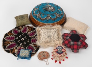 An antique beadwork footstool; together with an assorted group of antique and vintage pin cushions including advertising ware and an attractive piece with 1866 provenance note, (qty), the footstool 30cm diameter.