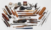 Assorted antique and vintage pin cases, pens, inkwells, sewing implements, jagging wheels etc., 19th and 20th century, (qty).