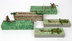 Five assorted Australian folk art jumping toys, including kangaroo, frogs and horse racing, mid 20th century, the largest 27cm long.