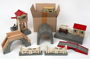 Australian folk art toy train accessories including signal tower, tunnel, bridge etc., mid 20th century, (qty), the largest 22cm high.