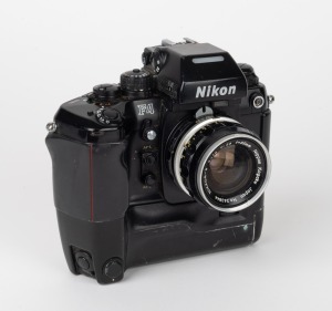 NIPPON KOGAKU: 1988 Nikon F4 SLR camera [#2528593] with Nikon MB-23 motor drive and Nikkor-S Auto 35mm f2.8 lens.