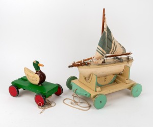 A vintage pull along boat toy; together with a pull along duck, mid 20th century, (2 items), ​​​​​​​the larger 43cm high.