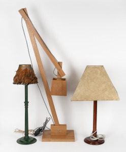 An adjustable timber desk lamp; together with two table lamps and shades (one with feather adornment), (3 items), the feather shade example 71cm high.