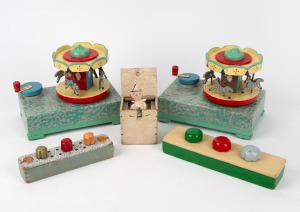Five assorted folk art toys including carousel, clacking machines and jack in the box, mid 20th century, (5 items), the carousels 19cm high.