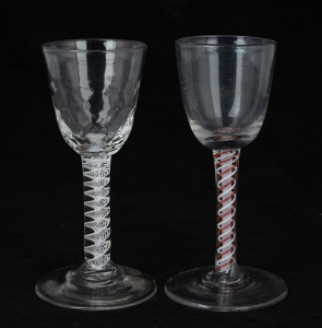 Two Georgian air twist wine glasses, (A/F), 18th century, 14.5 and 14cm high.