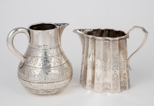 Two antique English sterling silver cream jugs, 19th century, 8.5cm high, 228 grams.