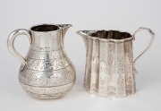 Two antique English sterling silver cream jugs, 19th century, 8.5cm high, 228 grams.