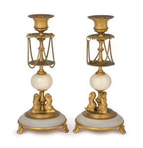 A pair of antique French gilt bronze and onyx candlesticks, 19th century, ​​​​​​​24cm high.