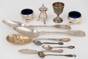 A pair of sterling silver salt cellars, pepper pot, berry spoon, pate knife, Norwegian sterling silver spoon, Turkish silver coin spoon, German silver teaspoon, Continental silver egg cup, and a pair of German silver tablespoons, (11 items), 358 grams total (not including glass liners).