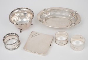 Sterling silver pierced dish, cigarette case, sugar bowl and three napkin rings, 19th/20th century, (6 items), 288 grams total.