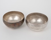 A pair of Indian silver finger bowls, 20th century, 5cm high, 10.5cm diameter, 160 grams total.