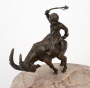 An antique Continental cast bronze and rouge marble dish featuring a putti riding a ram, early 20th century, 15cm high, 20cm wide. - 2