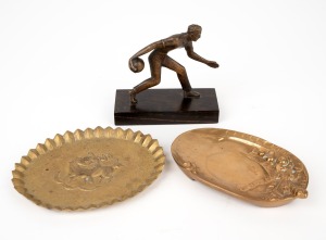 A cast bronze bowling figure on rosewood base; together with two cast bronze dishes, 19th/20th century, (3 items), the statue 9cm high overall.